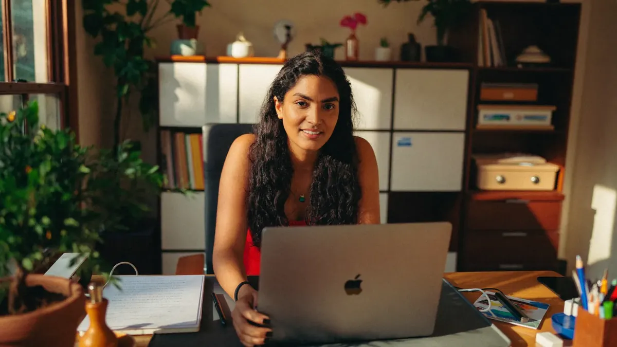 A self-employed consultant working from her home office